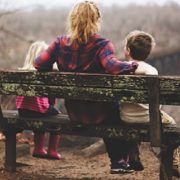 Parent with children on bench