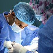 Surgery team conducting operation