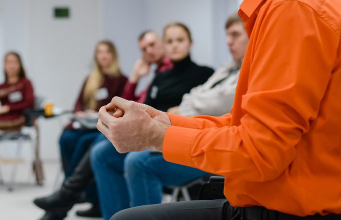 Lecturer conducts a lecture, training.