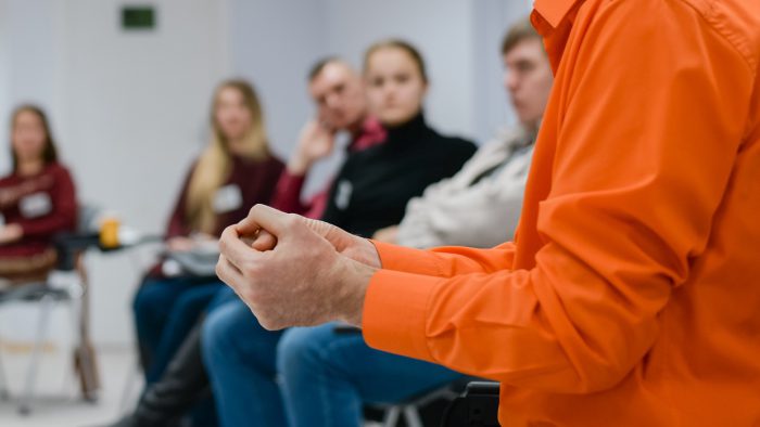 Lecturer conducts a lecture, training.