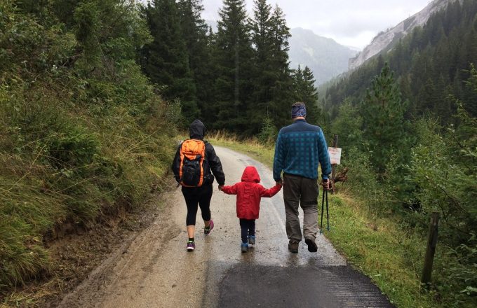 A family set out on a mountain road for a hike