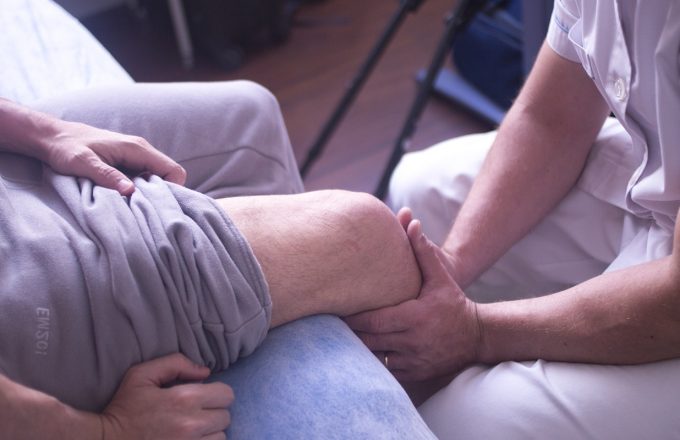 Physical therapy manual physiotherapy treatment by physiotherapist on patient for rehabilitation.