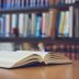 Open book on a desk in a library