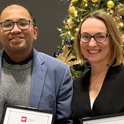 Professor Navonil Mustafee and Dr Alison Harper receive the Lyn Thomas Impact Medal