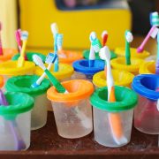 Colorful children's toothbrushes. Group of baby toothbrush prepare for use with children. Selective focus