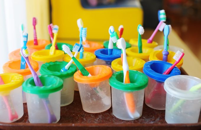 Colorful children's toothbrushes. Group of baby toothbrush prepare for use with children. Selective focus